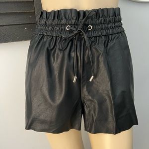 Paper bag style leather shorts